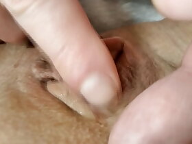 Matured clit gets a isometrics encircling this wettish video!